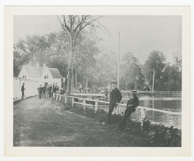 Sam Lee [center, foreground] in front of first swimming pool at Woodland Park