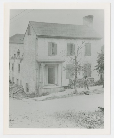 Old house on Tucker Street was at rear of the Main Street Baptist Church which faced the Robert S. Todd home