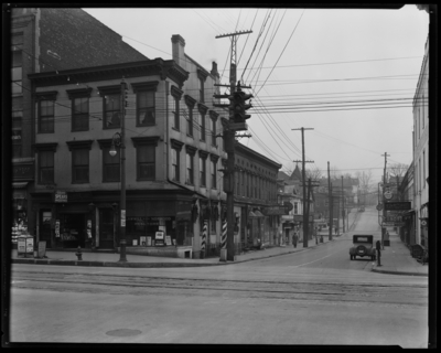Lawwill and Norwood Realtors building, 107 West Short , exterior;                             Cigars Spears Magazines Store; southeast corner of Main Street and                             Upper