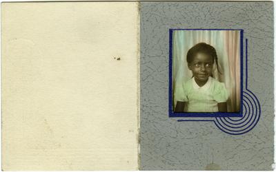 Unidentified African American female child; photo taken at a photo booth