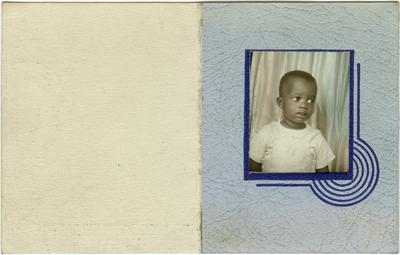 Unidentified African American male child; photo taken at a photo booth
