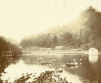 Vacationers at Camp Natural Bridge in rowboats on lake; natural Bridge, Kentucky
