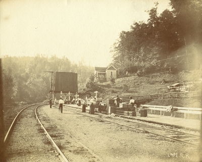 Train station at Natural Bridge, Kentucky; Lexington and Eastern Railway; passengers with luggage waiting for train