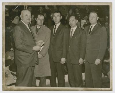 Adolph Rupp, Samim Gorec, Hiorshi Saito, Shiro Yoshii, and Jerry Gray