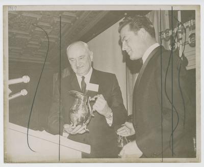 Adolph Rupp accepting 