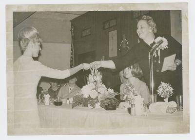 Adolph Rupp and unidentified women