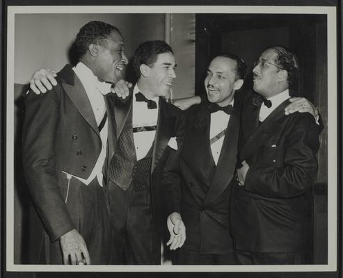 Lyman Johnson and three men, Alpha Lambda, AΦA, Dinner-Dance honoring wives and Alpha man of the year, Lyman T. Johnson, Louisville