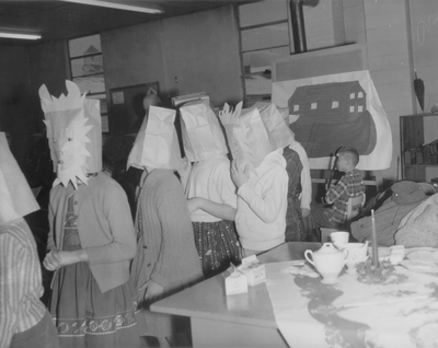 Performance by John Jacob Niles for children and dramatization of folk ballads by children; Harlan County, KY