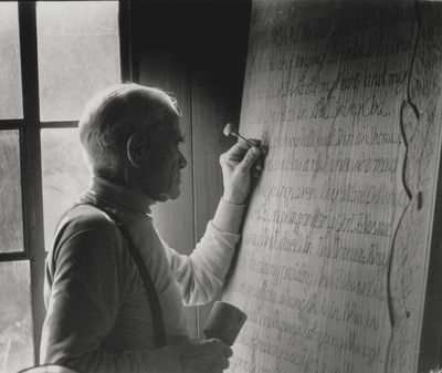 John Jacob Niles carving the doors for St. Hubert's Church; Boot Hill Farm; Van Coke