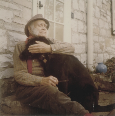 John Jacob Niles with dog Rosie; Boot Hill Farm