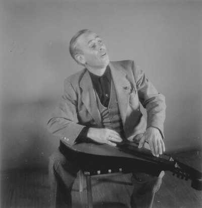 John Jacob Niles posed with dulcimer
