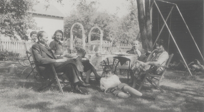 Three Lipetz family snapshots taken at Slingerland's home in New York; M. Moloslov, E. Slingerland, Vasile Lipetz, Harold Slingerland, Rena's aunt, and Van Slingerland lying on ground