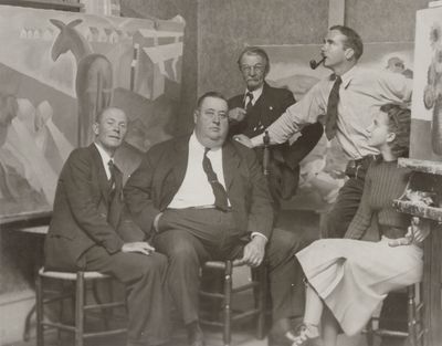 Frank Long (second from right), Rena Niles (far right) in Long Studio with unidentified man; Berea, KY