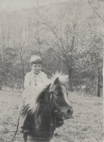 Tom Niles on a pony named Plum; Boot Hill Farm