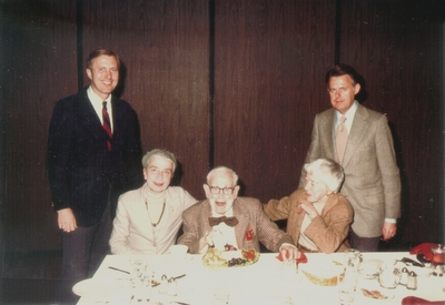 John Jacob Niles 87th birthday; Left to right: Arch Mainous, Jr., Rena and John Jacob Niles, Carolina Hammer, and Thomas Charles Barnes; Arch Mainous, Jr. and Rena Niles