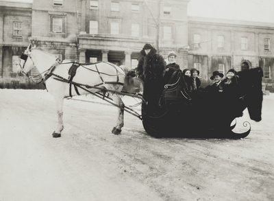 John Jacob Niles (2nd from left) with Marion Kerby (far right) in sleigh during tour of Holland