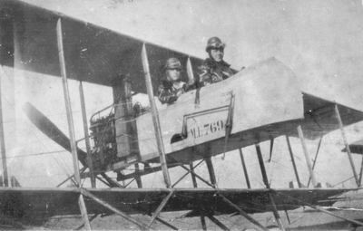 2 men in biplane