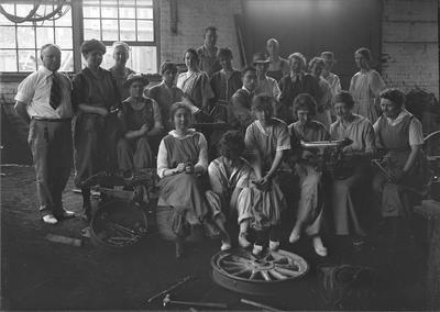 group portrait in a tool shop