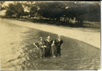 3 women standing in water circa 1914