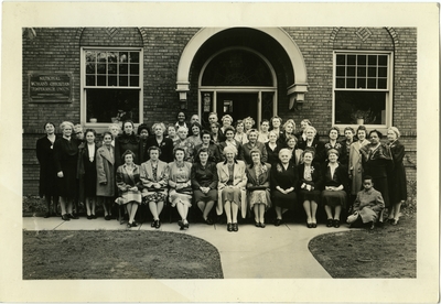 Elizabeth Beatrice Cooke Fouse; in a group photo in front of the National Woman's Christian Temperance Union Administration Offices in Evanston, Illinois
