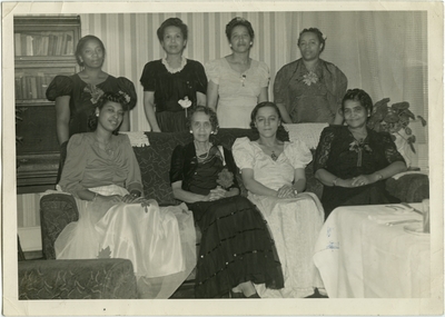 Elizabeth Beatrice Cooke Fouse; posed with seven unidentified women