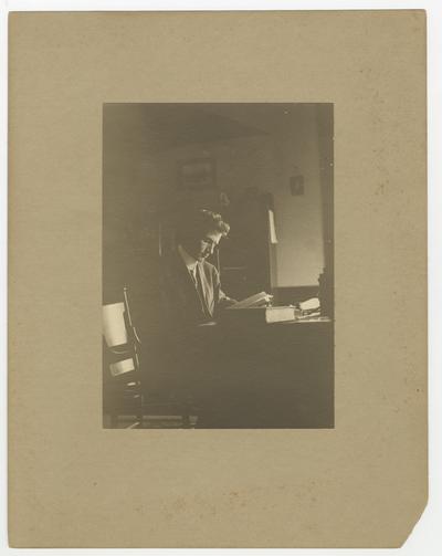 Unidentified man reading