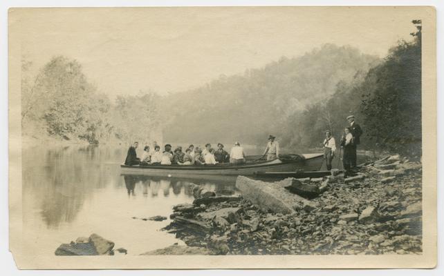 A group of men and women [g]oing down to locks on Sunday in motor boat, Kentucky River, 1919-1923