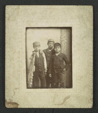 Portrait of three unidentified black children