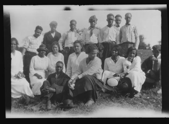 Negative of unidentified men and a woman