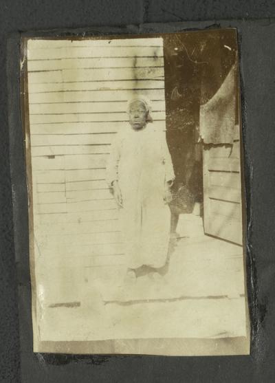 Page 8 [L]: Unidentified elderly black woman