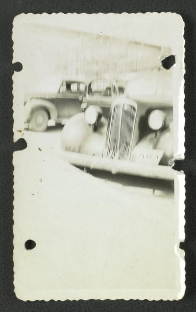 On top of Norris dam. Mrs. Dorothy Draper car blurry image of car