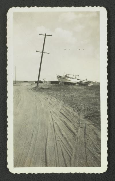 Boat blown on to dry land after hurricane in Bay St. Louis, Mississippi