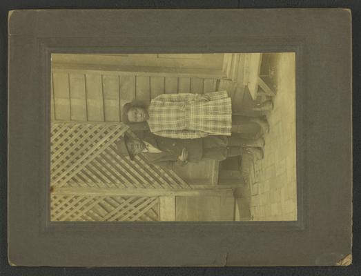 Portrait of two unidentified black children, one boy and one girl, note on back reads: Florizell Wilson, from Mildred and Jessie Belle [illegible] [illegible], wite [sic] me, Florizell