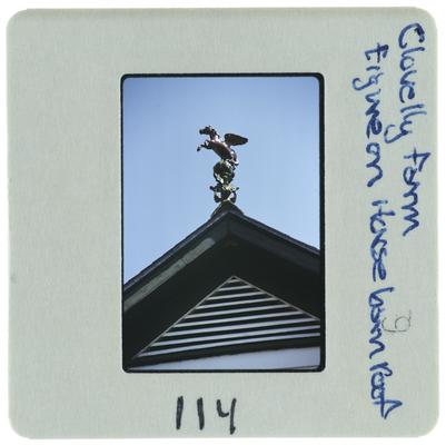 Clovelly Farm figure on horse barn roof