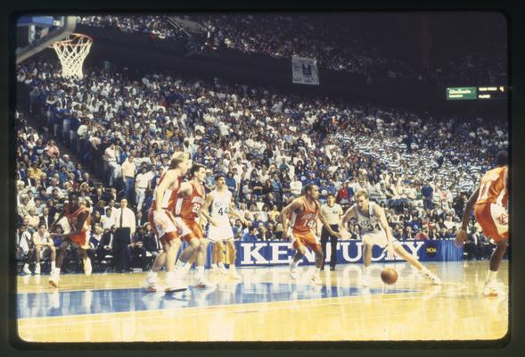 John Pelphrey with ball, Gimel Martinez watching, UK vs. Auburn