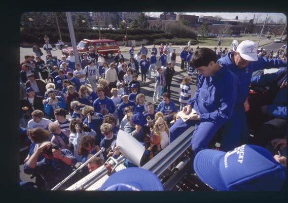 Rick Pitino signs autographs in UK parade