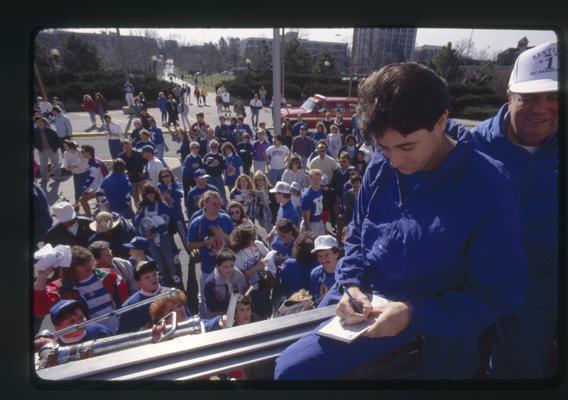 Rick Pitino signs autographs in UK parade