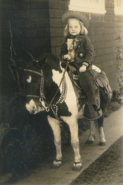 Two photos in one folder. Each is of a child on a pony. Susan E. Wilson: 5 [five] years. Patsy Wilson: 4 [four] years. San Diego. Jan. 1950