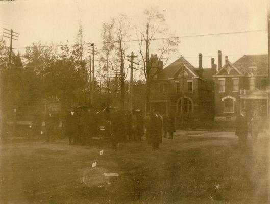 Group of men by the church