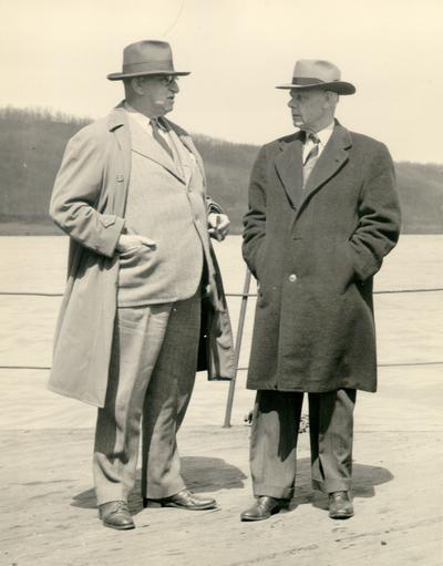 Charles R. Staples and Robert Stuart Sanders on a boat on Ohio River crossing to Augusta, KY.; Photo by Winston Coleman. Lexington, KY