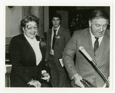 Georgia Davis Powers and two other men standing