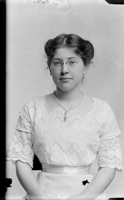 Portrait of a seated woman identified as 