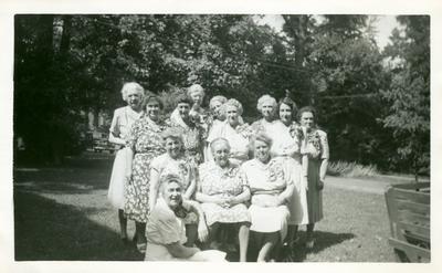 Margaret Wickliffe Preston Johnson (1885-1964) at a Daughters of the American Revolution (DAR) meeting, handwritten in ink on back of image 