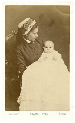Infant with unidentified woman, handwritten on back in ink 