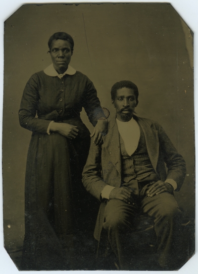 Unidentified African American male and female ; photo located on page 16 of album