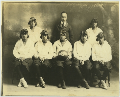 African American women's basketball team and coach E.J. Hooper at Oliver High School in Winchester, Kentucky