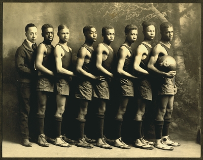 African American men's basketball team and coach E.J. Hooper at Oliver High School in Winchester, Kentucky