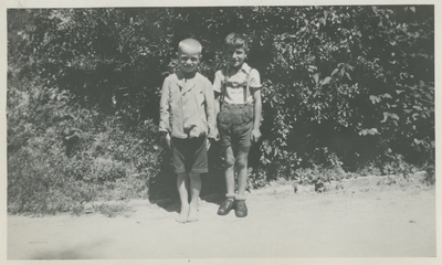 Two boys outside.   