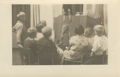 Students watching puppet show.  