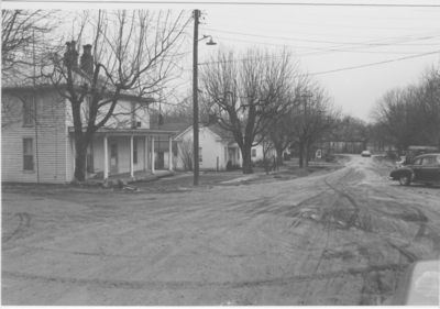 Series S- S6: Taylorsville (Ky.), unpaved street showing several houses